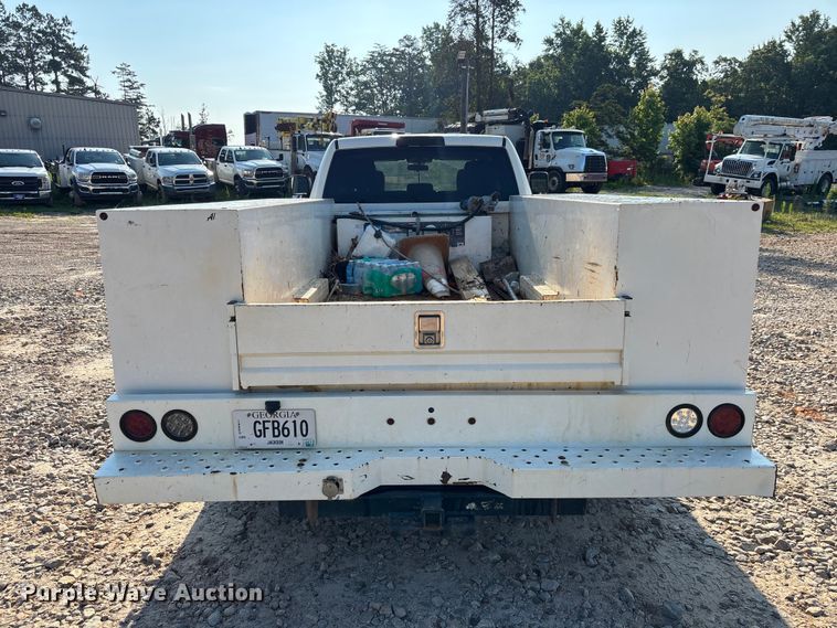 image for item DU6320 2021 RAM 3500 Crew Cab utility bed pickup truck