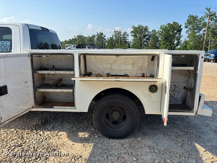 image for item DU6320 2021 RAM 3500 Crew Cab utility bed pickup truck