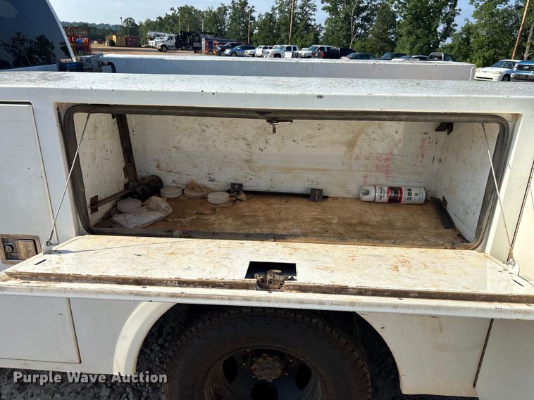 image for item DU6320 2021 RAM 3500 Crew Cab utility bed pickup truck