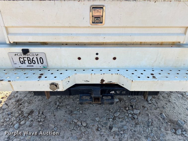 image for item DU6320 2021 RAM 3500 Crew Cab utility bed pickup truck