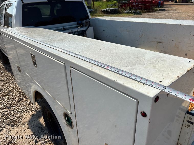 image for item DU6320 2021 RAM 3500 Crew Cab utility bed pickup truck