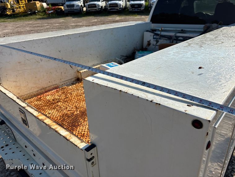 image for item DU6320 2021 RAM 3500 Crew Cab utility bed pickup truck
