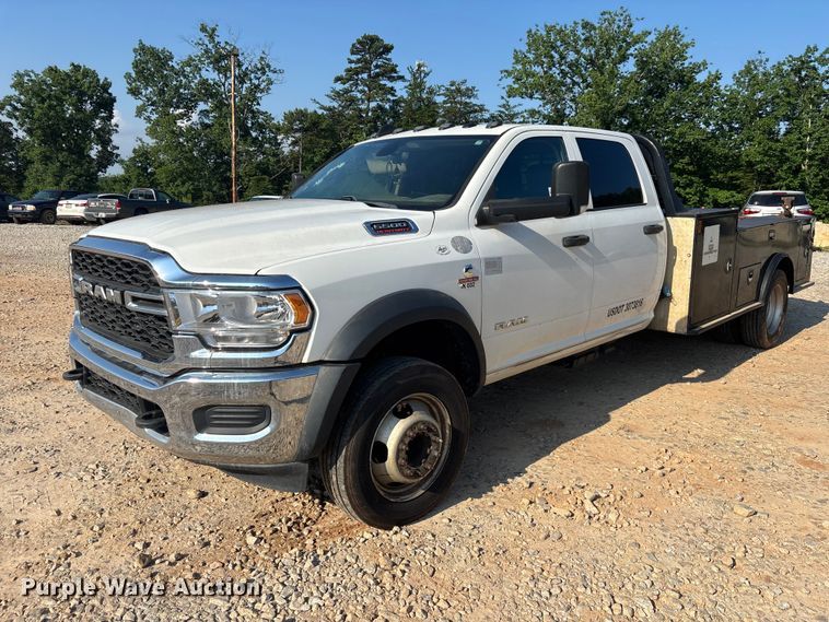 image for item DU6328 2020 RAM 5500 Crew Cab flatbed truck