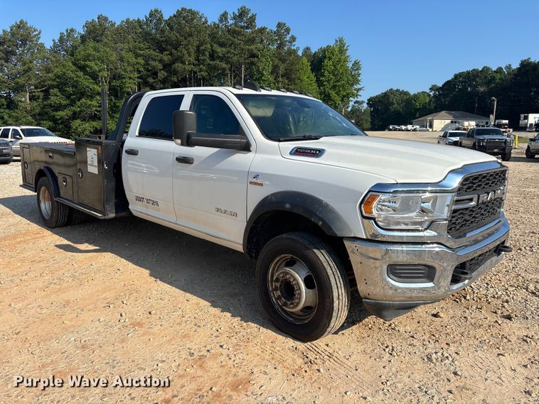 image for item DU6328 2020 RAM 5500 Crew Cab flatbed truck