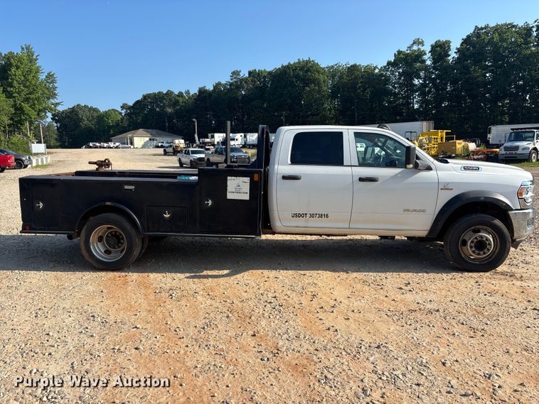 image for item DU6328 2020 RAM 5500 Crew Cab flatbed truck