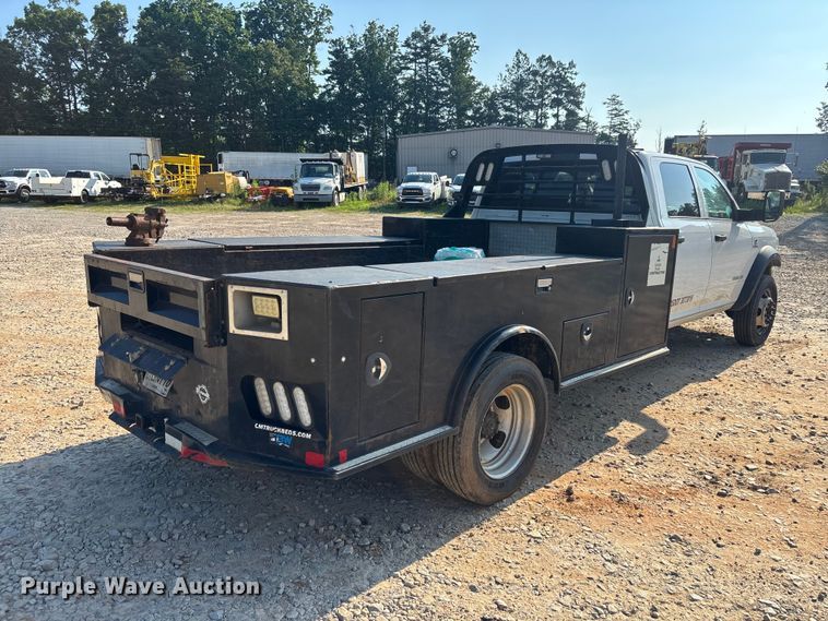 image for item DU6328 2020 RAM 5500 Crew Cab flatbed truck