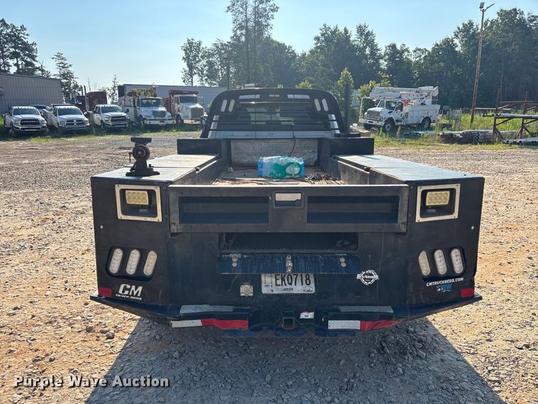 image for item DU6328 2020 RAM 5500 Crew Cab flatbed truck