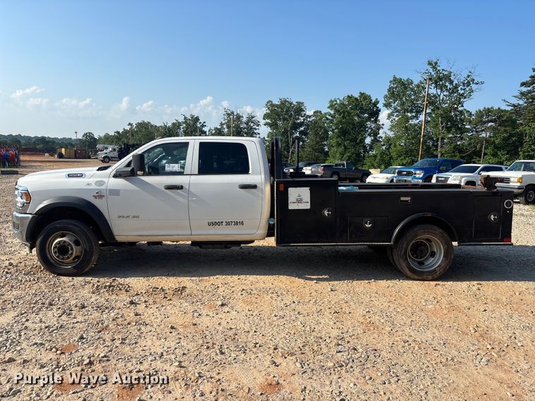 image for item DU6328 2020 RAM 5500 Crew Cab flatbed truck