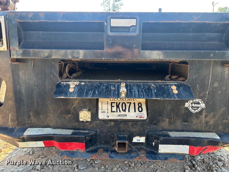 image for item DU6328 2020 RAM 5500 Crew Cab flatbed truck