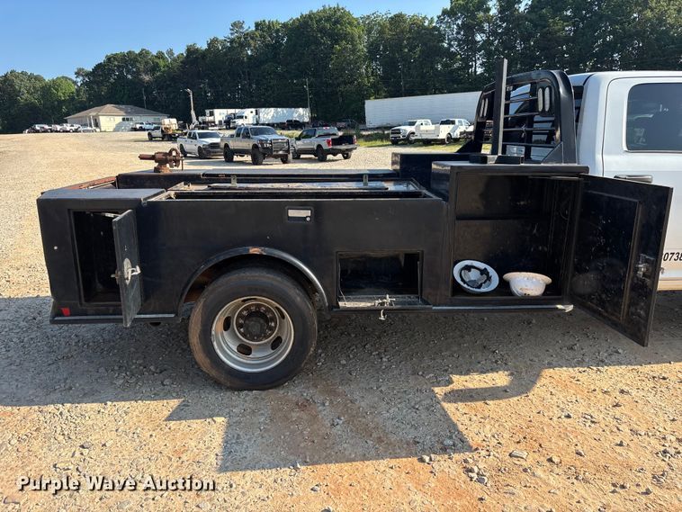 image for item DU6328 2020 RAM 5500 Crew Cab flatbed truck