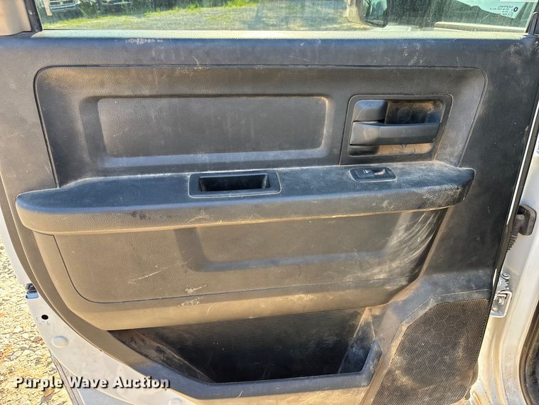 image for item DU6328 2020 RAM 5500 Crew Cab flatbed truck