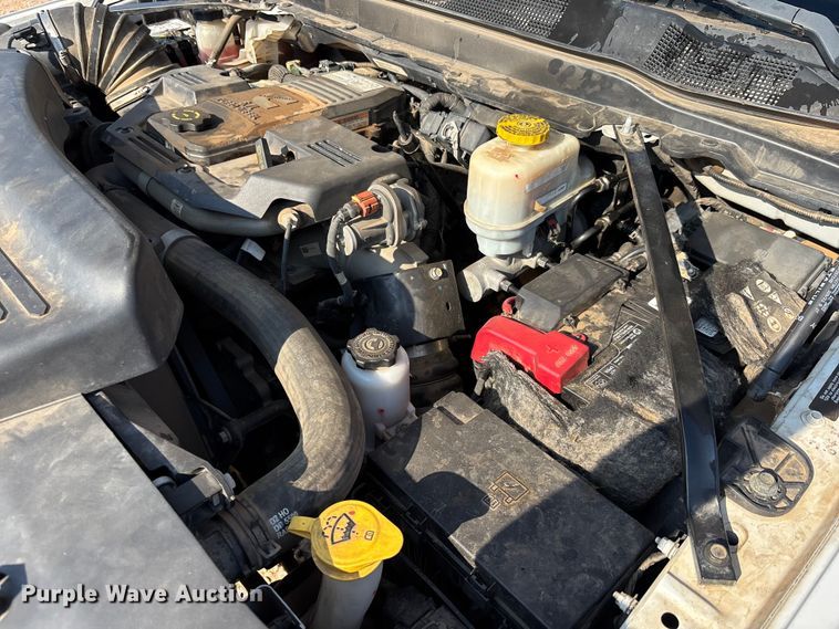 image for item DU6328 2020 RAM 5500 Crew Cab flatbed truck