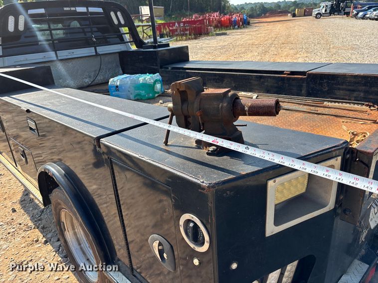image for item DU6328 2020 RAM 5500 Crew Cab flatbed truck