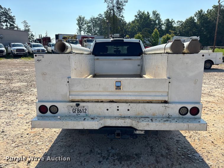 image for item DU6329 2021 RAM 3500 Crew Cab utility bed pickup truck