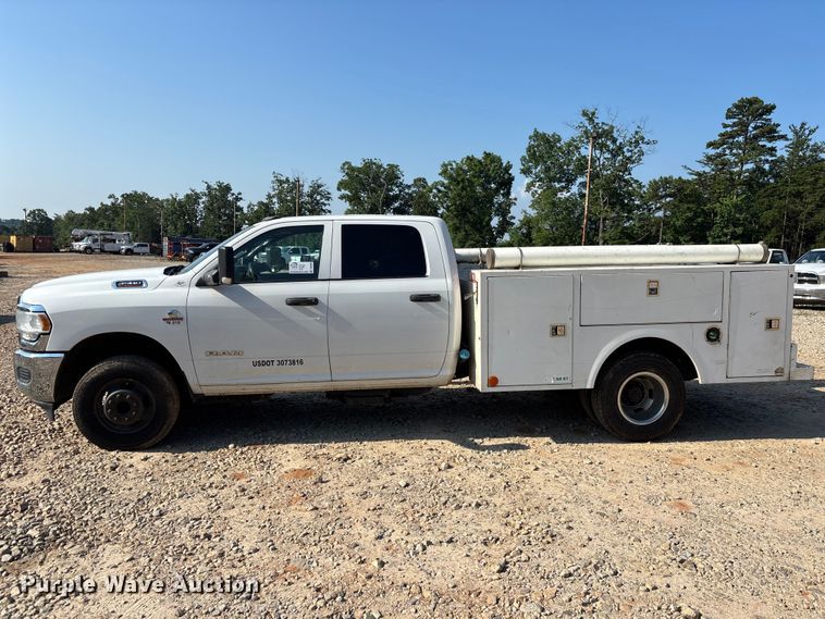 image for item DU6329 2021 RAM 3500 Crew Cab utility bed pickup truck