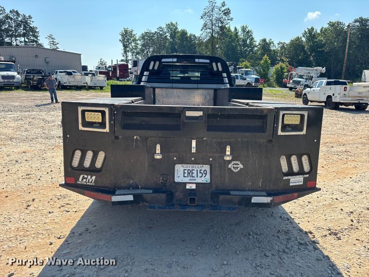image for item DU6333 2020 RAM 5500 Crew Cab flatbed truck