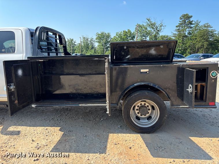 image for item DU6333 2020 RAM 5500 Crew Cab flatbed truck