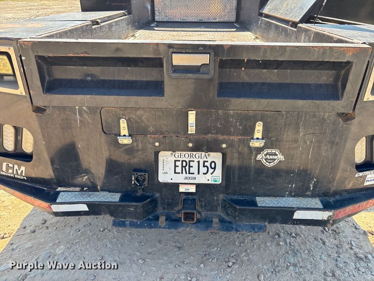 image for item DU6333 2020 RAM 5500 Crew Cab flatbed truck