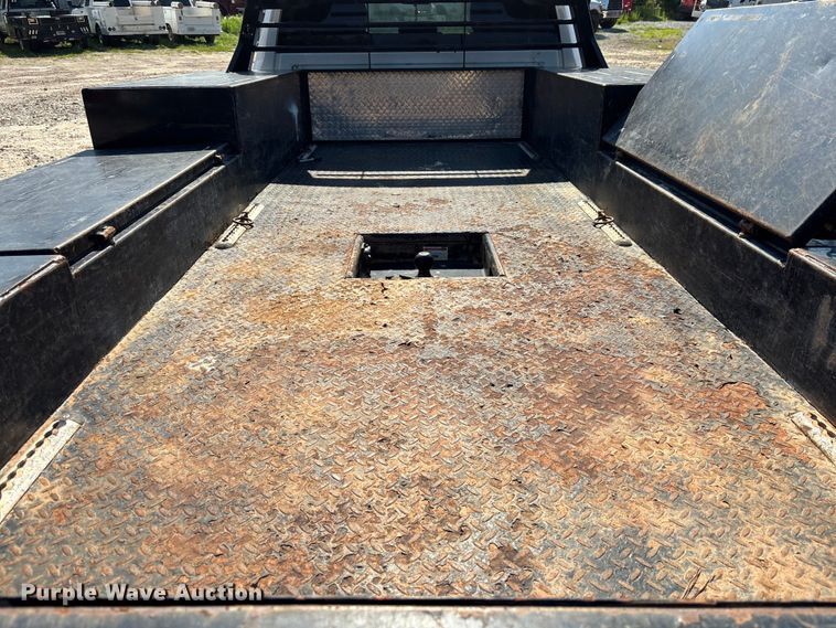 image for item DU6333 2020 RAM 5500 Crew Cab flatbed truck