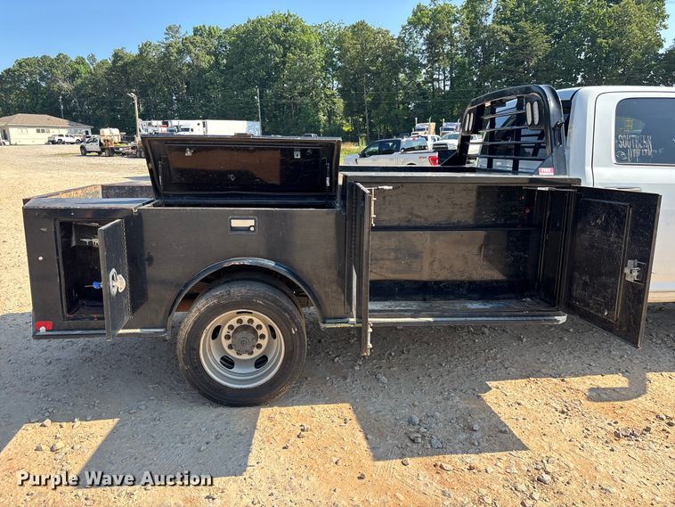 image for item DU6333 2020 RAM 5500 Crew Cab flatbed truck