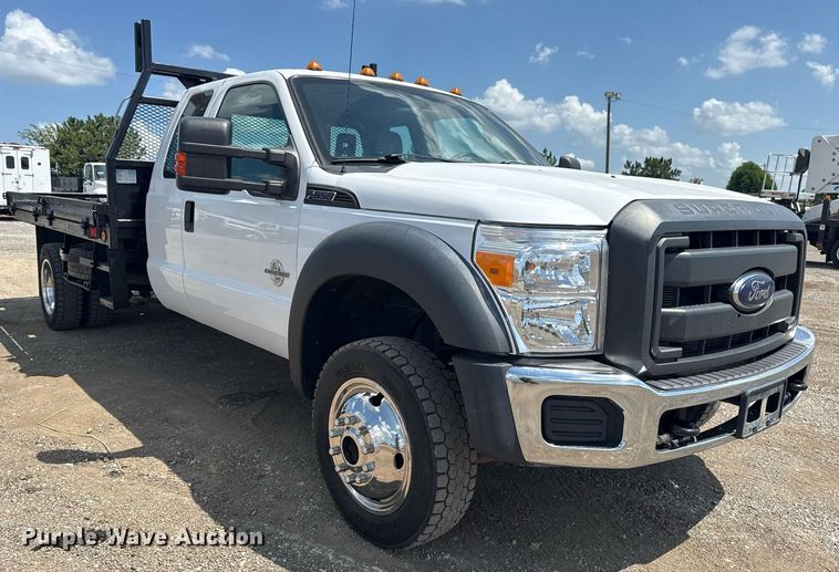 image for item EG6061 2012 Ford F550 Super Duty SuperCab flatbed pickup truck