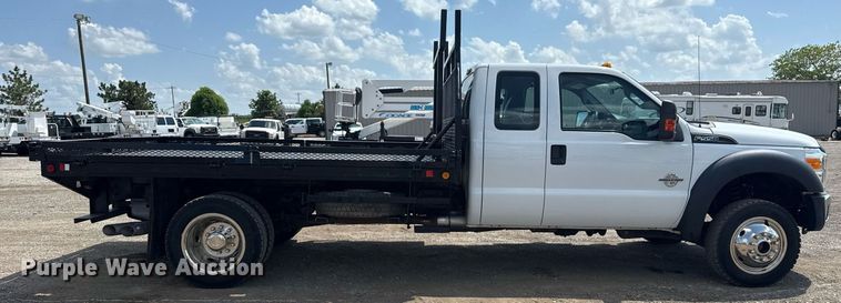image for item EG6061 2012 Ford F550 Super Duty SuperCab flatbed pickup truck