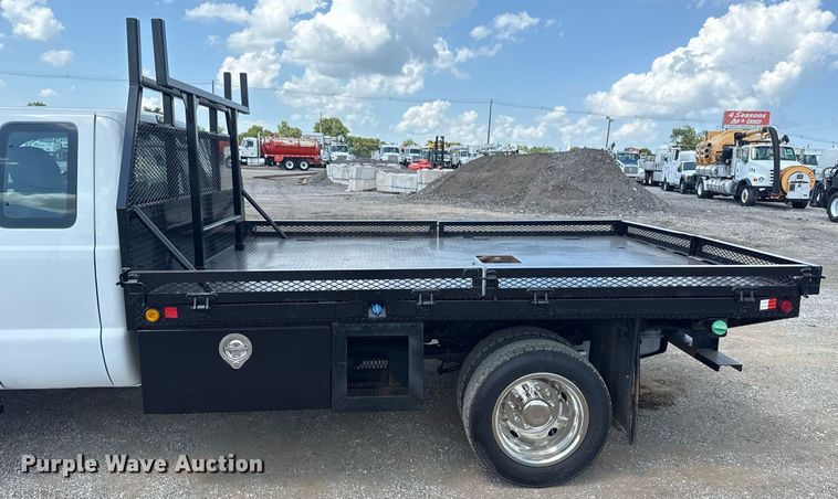 image for item EG6061 2012 Ford F550 Super Duty SuperCab flatbed pickup truck