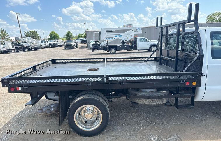 image for item EG6061 2012 Ford F550 Super Duty SuperCab flatbed pickup truck