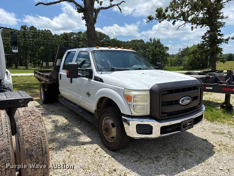 image for item FG0511 2011 Ford F350 Super Duty Crew Cab flatbed pickup truck