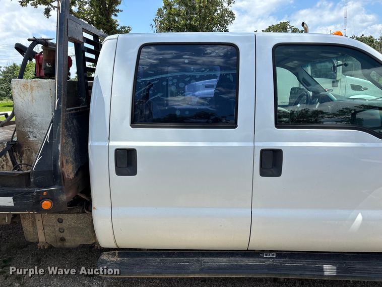 image for item FG0511 2011 Ford F350 Super Duty Crew Cab flatbed pickup truck