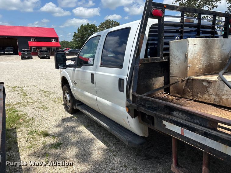 image for item FG0511 2011 Ford F350 Super Duty Crew Cab flatbed pickup truck