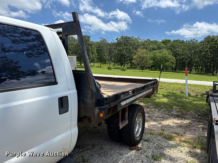 image for item FG0511 2011 Ford F350 Super Duty Crew Cab flatbed pickup truck
