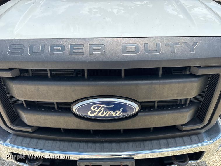 image for item FG0511 2011 Ford F350 Super Duty Crew Cab flatbed pickup truck