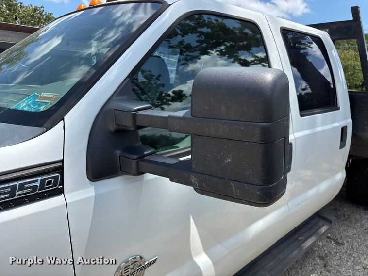 image for item FG0511 2011 Ford F350 Super Duty Crew Cab flatbed pickup truck