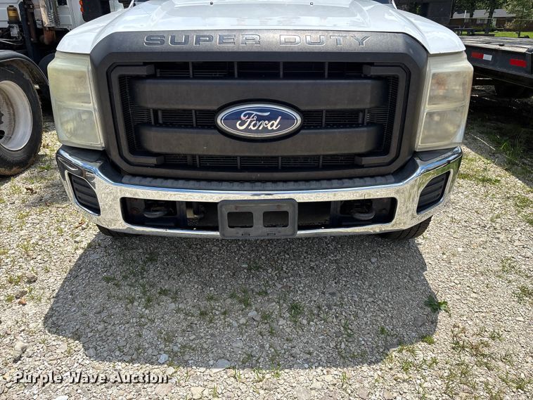 image for item FG0511 2011 Ford F350 Super Duty Crew Cab flatbed pickup truck