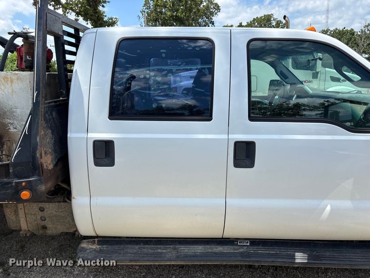 image for item FG0511 2011 Ford F350 Super Duty Crew Cab flatbed pickup truck