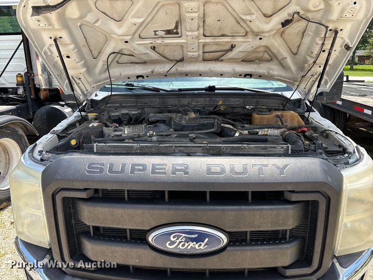 image for item FG0511 2011 Ford F350 Super Duty Crew Cab flatbed pickup truck