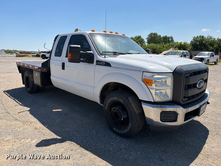 image for item FI0274 2016 Ford F350 Super Duty Ext. Cab flatbed pickup truck