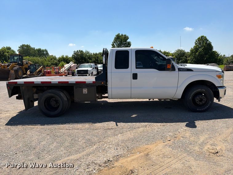 image for item FI0274 2016 Ford F350 Super Duty Ext. Cab flatbed pickup truck