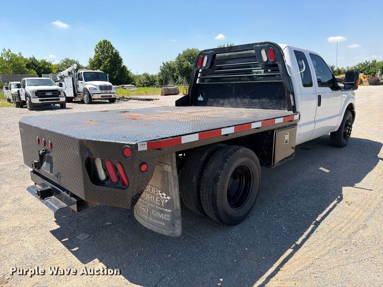 image for item FI0274 2016 Ford F350 Super Duty Ext. Cab flatbed pickup truck