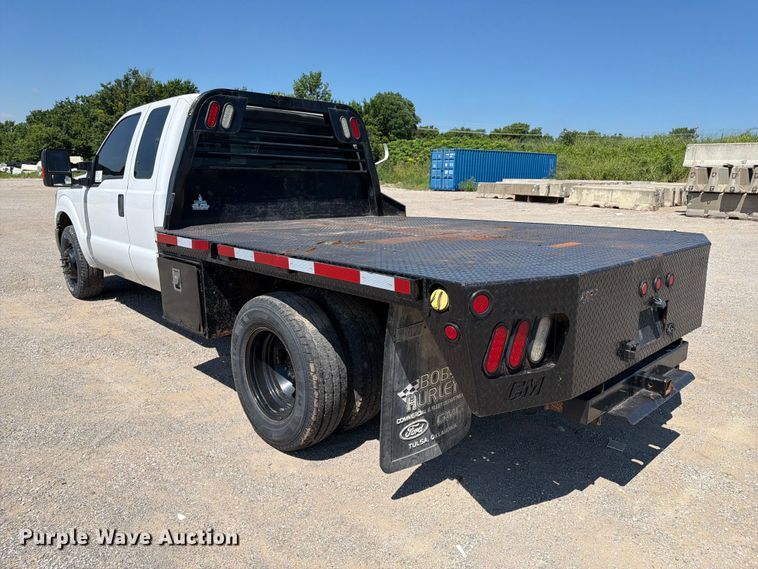 image for item FI0274 2016 Ford F350 Super Duty Ext. Cab flatbed pickup truck