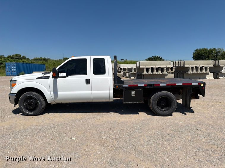 image for item FI0274 2016 Ford F350 Super Duty Ext. Cab flatbed pickup truck