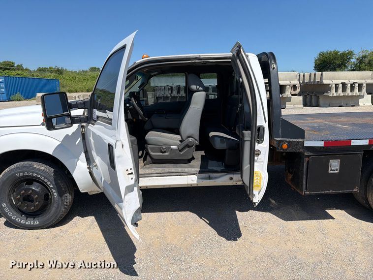 image for item FI0274 2016 Ford F350 Super Duty Ext. Cab flatbed pickup truck