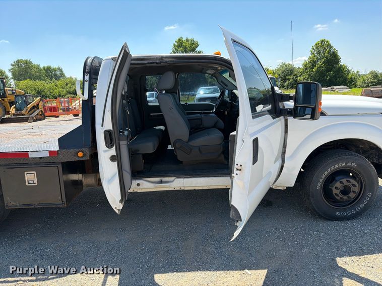 image for item FI0274 2016 Ford F350 Super Duty Ext. Cab flatbed pickup truck