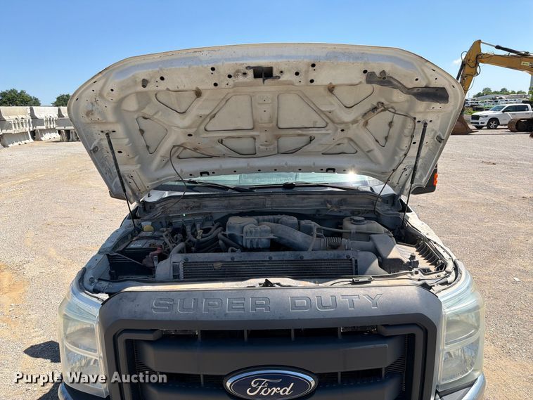 image for item FI0274 2016 Ford F350 Super Duty Ext. Cab flatbed pickup truck