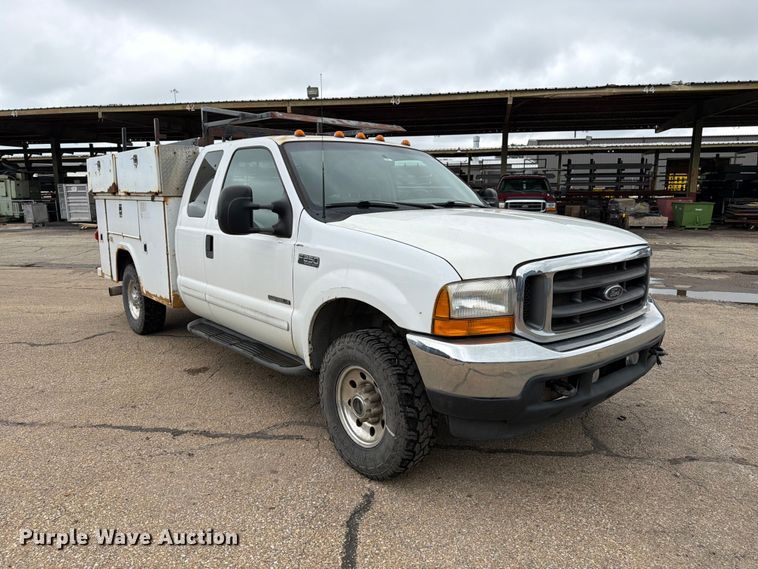 image for item FK3101 2001 Ford F250 Super Duty XL Ext. Cab utility bed pickup truck