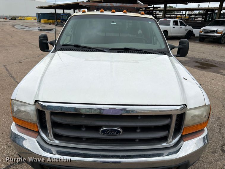 image for item FK3101 2001 Ford F250 Super Duty XL Ext. Cab utility bed pickup truck