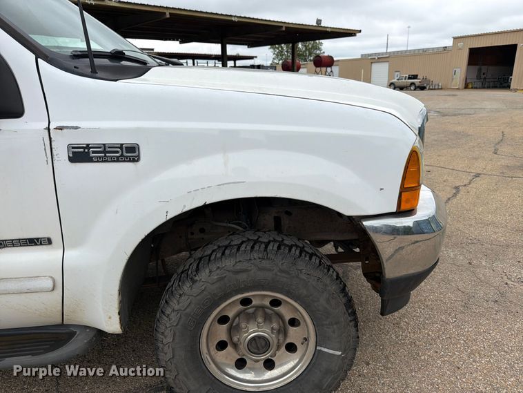 image for item FK3101 2001 Ford F250 Super Duty XL Ext. Cab utility bed pickup truck