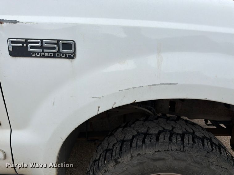 image for item FK3101 2001 Ford F250 Super Duty XL Ext. Cab utility bed pickup truck