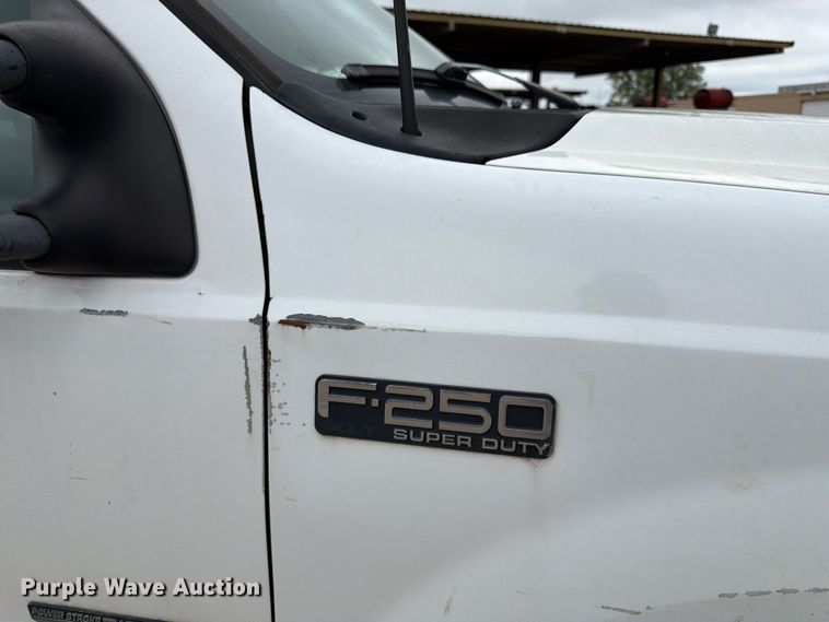image for item FK3101 2001 Ford F250 Super Duty XL Ext. Cab utility bed pickup truck